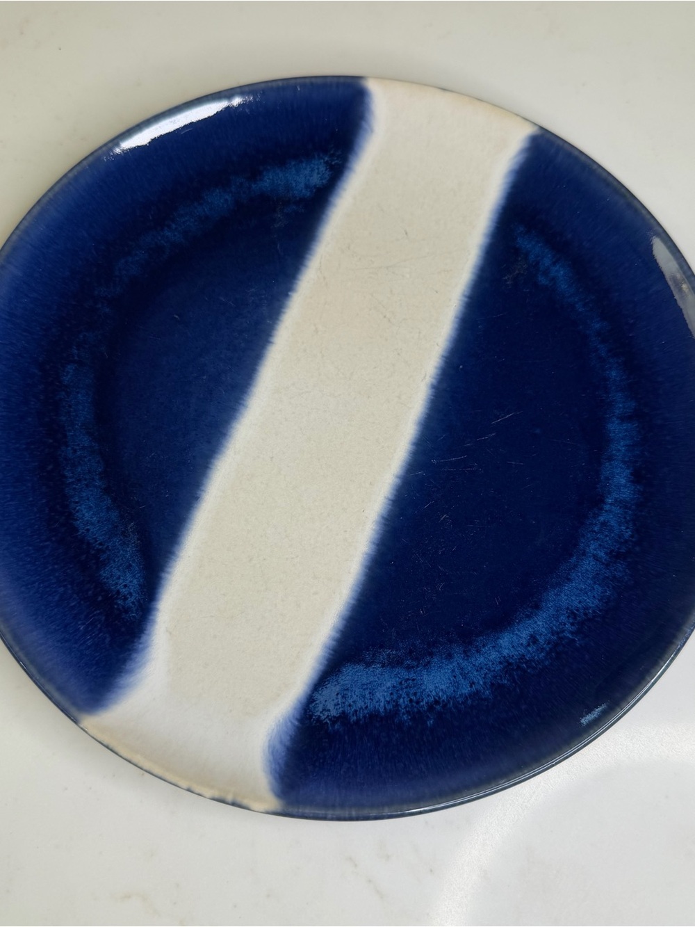 Crate and Barrel Handcrafted Blue and Cream Ceramic accent Plate
